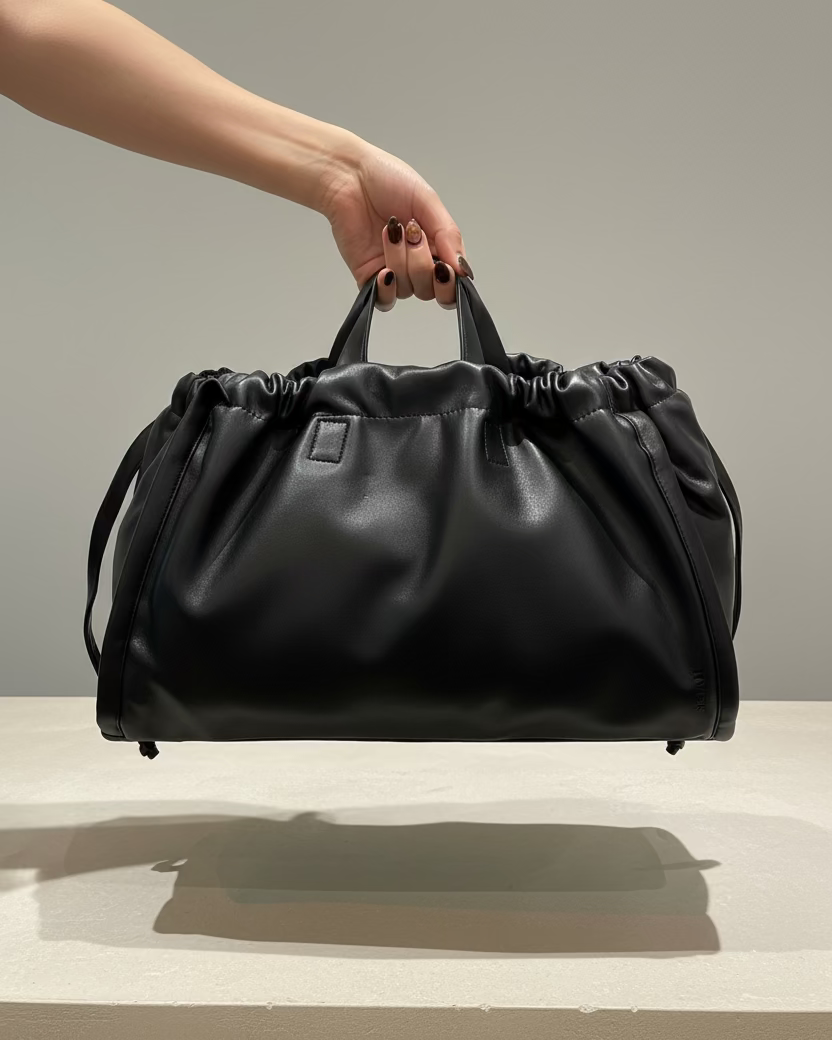 Hvisk - laukku - musta